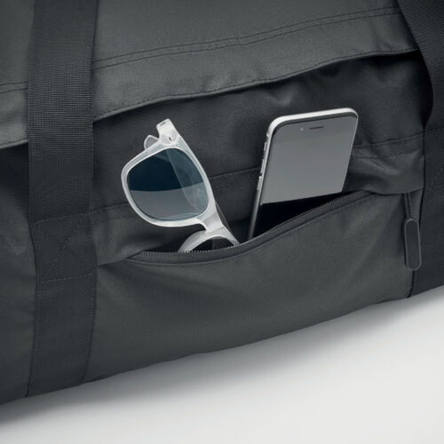 Bolso deportivo Valley en poliéster reciclado RPET con compartimento lateral, base rígida, correa ajustable y áreas amplias para personalización ecológica