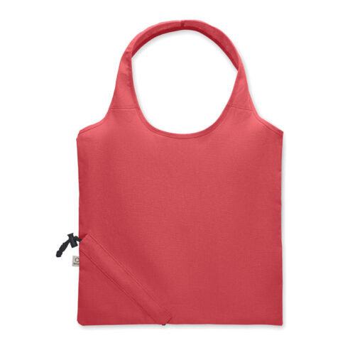 Bolsa plegable ecológica CARRIE fabricada en algodón reciclado y RPET, con diseño compacto y sistema de almacenamiento en su propio bolsillo