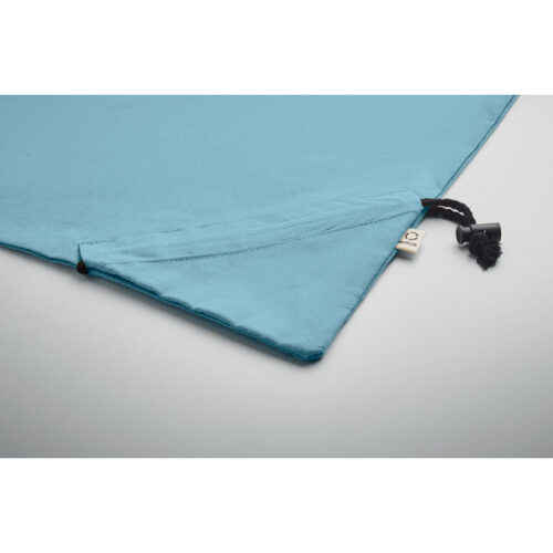 Bolsa plegable ecológica CARRIE fabricada en algodón reciclado y RPET, con diseño compacto y sistema de almacenamiento en su propio bolsillo