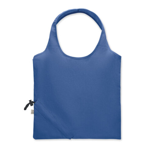 Bolsa plegable ecológica CARRIE fabricada en algodón reciclado y RPET, con diseño compacto y sistema de almacenamiento en su propio bolsillo