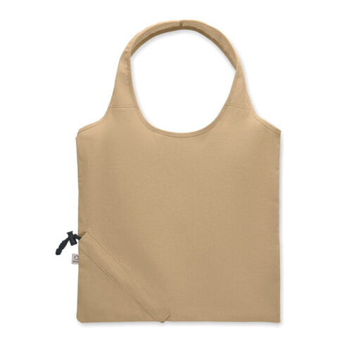 Bolsa plegable ecológica CARRIE fabricada en algodón reciclado y RPET, con diseño compacto y sistema de almacenamiento en su propio bolsillo