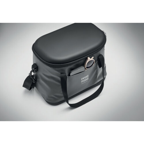 Lonchera térmica promocional Coolin de 40 litros con bolsillo frontal, abrebotellas y correa ajustable