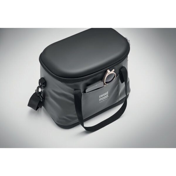 Lonchera térmica promocional Coolin de 40 litros con bolsillo frontal, abrebotellas y correa ajustable