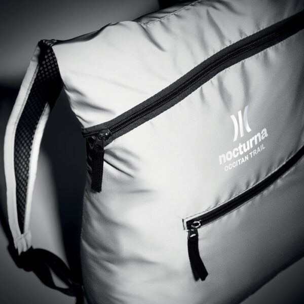 Mochila reflectante plegable DESTELLO con bolsillo frontal y tirantes ajustables