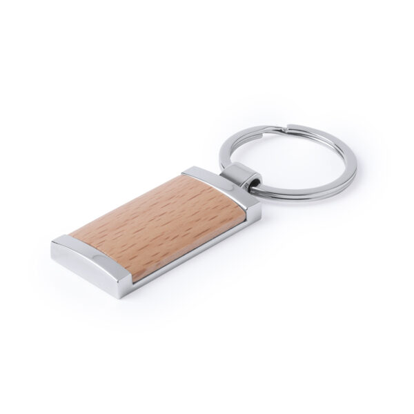 Llavero redondo de madera y metal brillante con diseño elegante, ideal para personalización con logotipo grabado