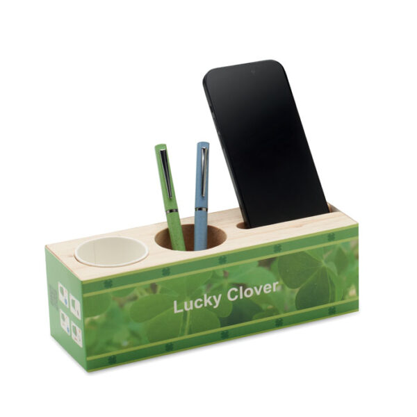 El soporte de madera con semillas THILA organiza tu escritorio y te permite plantar tréboles. Funcional, ecológico y perfecto para regalos corporativos.