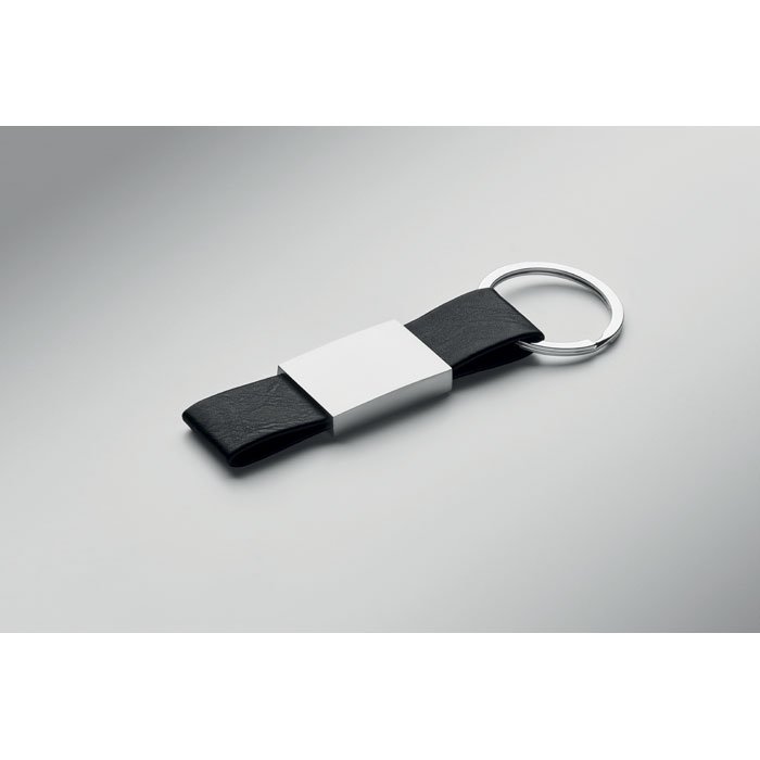Llavero de PU negro con placa de aleación de zinc lista para grabar